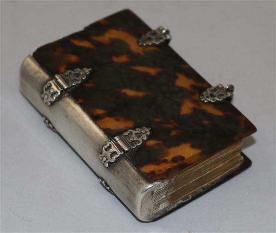 An 18th century silver mounted tortoiseshell German prayer book, 80mm.